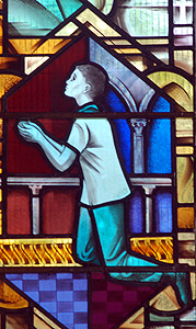 Worshipping boy on the north aisle window July 2012